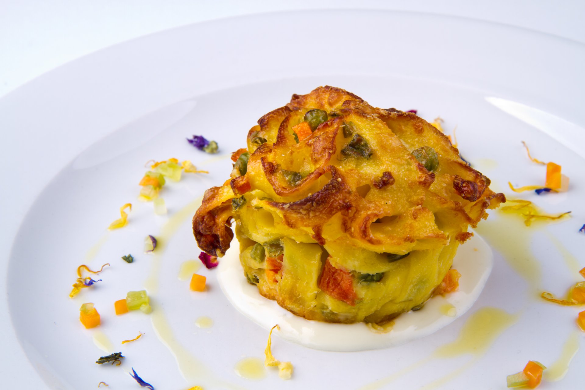 Tagliatelle, spring vegetable and stracchino cheese timbale - Enyo